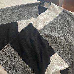 Monochromatic grey and black poncho